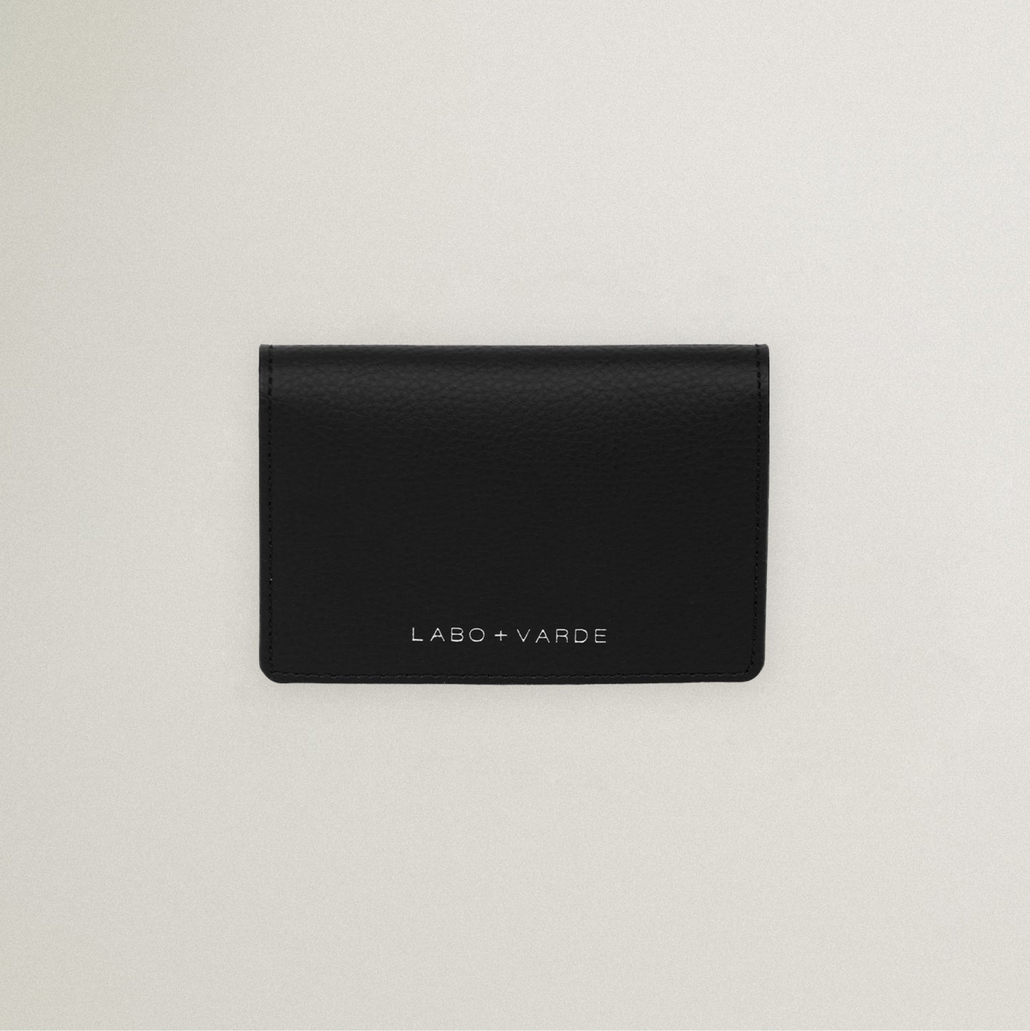 Labovarde Business Card Holder in Black — Top-down view showing the silver debossed logo
