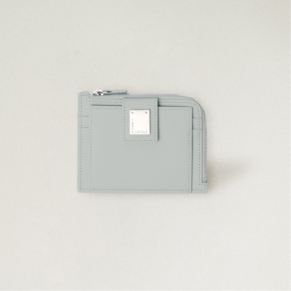 Labovarde Zipper Card Wallet in Clear Blue— Front view highlighting the signature silver metal plate and zipper closure