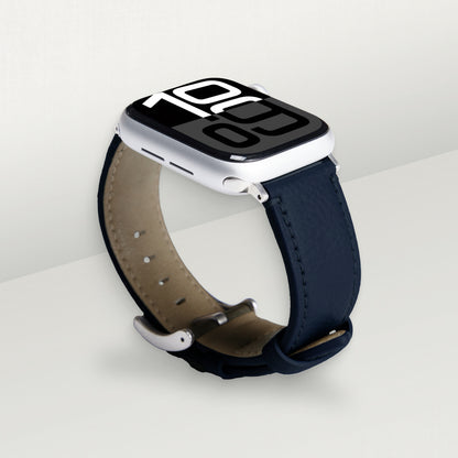 Labovarde Apple Watch band in navy — angled view showing the beige lining and silver buckle
