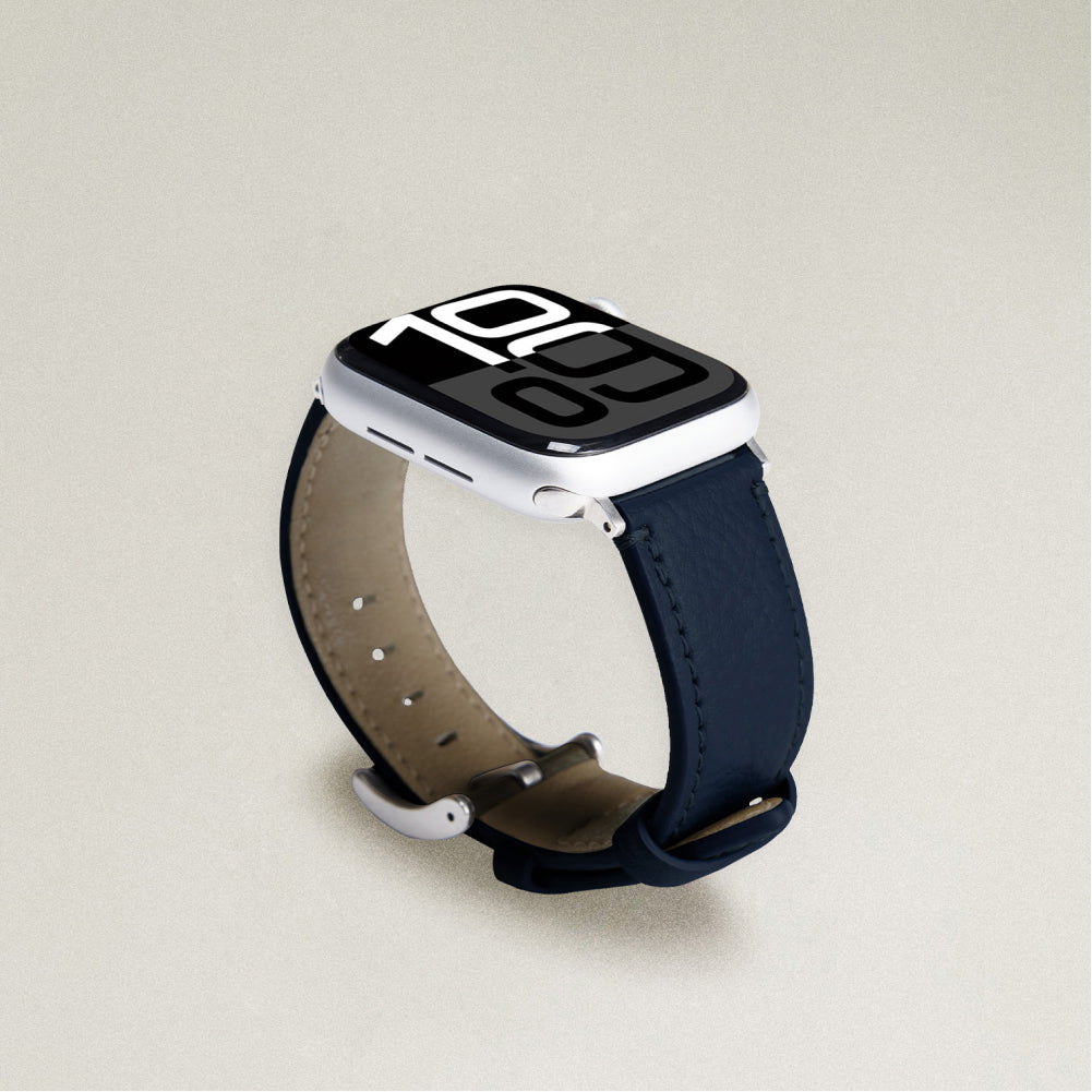 Labovarde Apple Watch band in Navy — angled view showing the beige lining and silver buckle