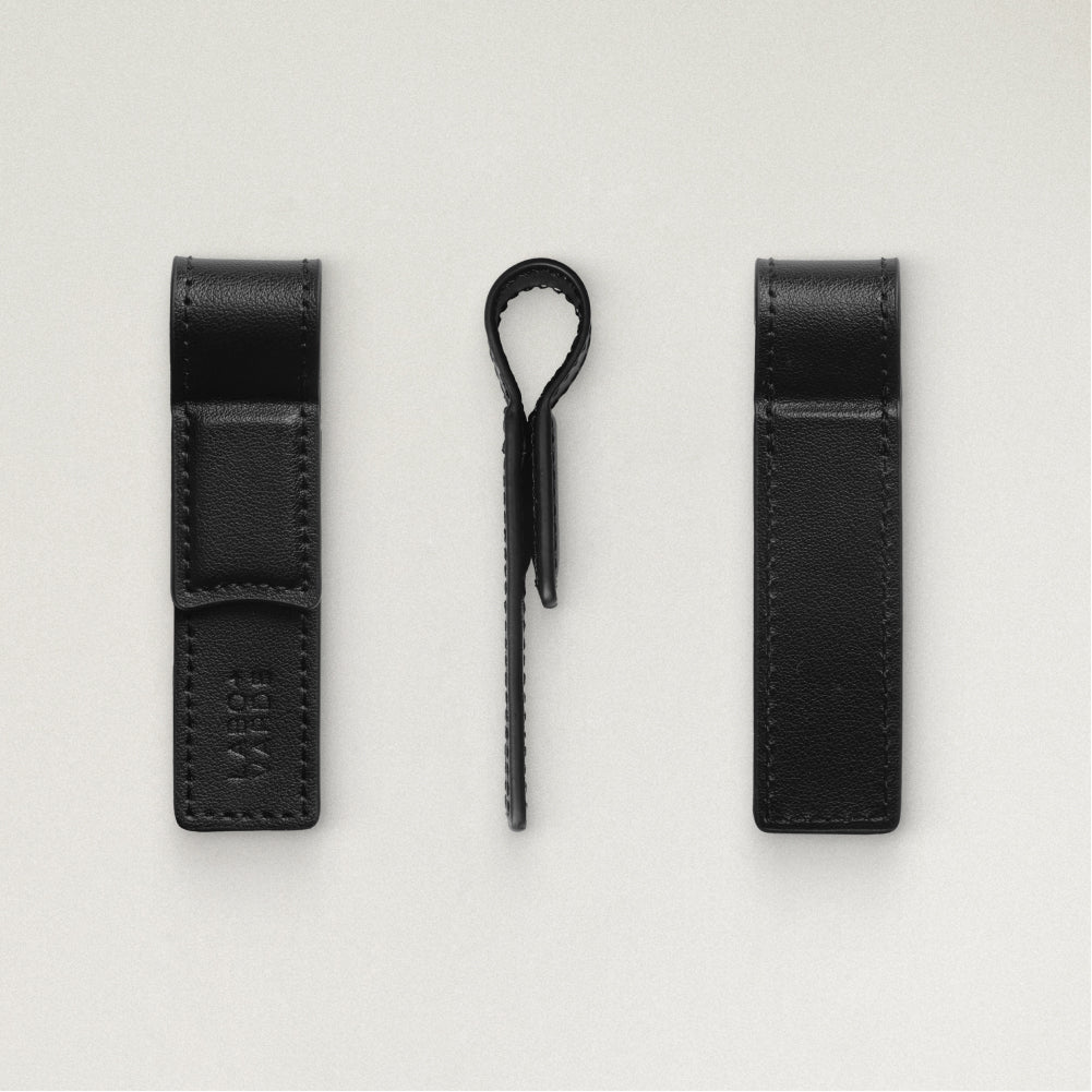 Labovarde Book Clip in Black — Multi-angle studio shot showing the front with debossed logo, side profile, and back views