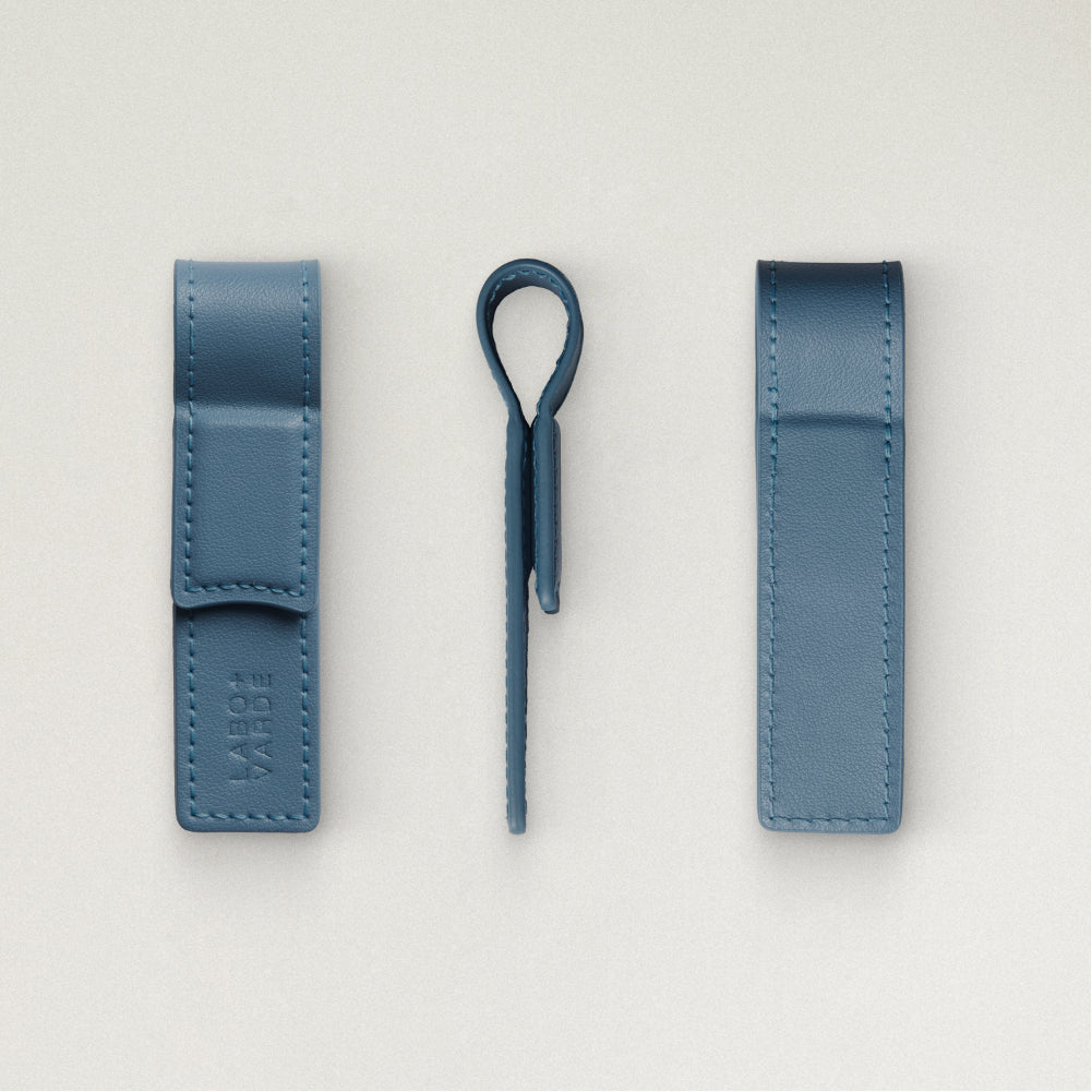 Labovarde Book Clip in pale-blue — Multi-angle studio shot showing the front with debossed logo, side profile, and back views