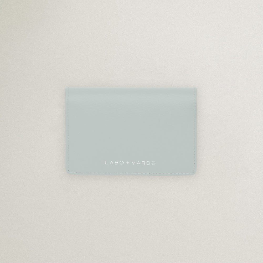 Labovarde Business Card Holder in Clear Blue — Top-down view showing the silver debossed logo