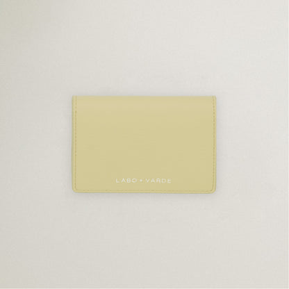 Labovarde Business Card Holder in Light Yellow — Top-down view showing the silver debossed logo