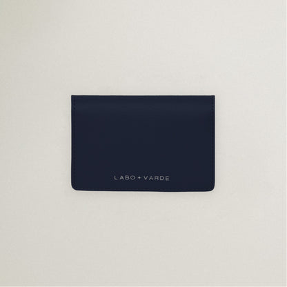 Labovarde Business Card Holder in Navy — Top-down view showing the silver debossed logo