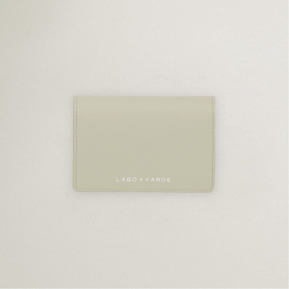 Labovarde Business Card Holder in Sand Gray — Top-down view showing the silver debossed logo