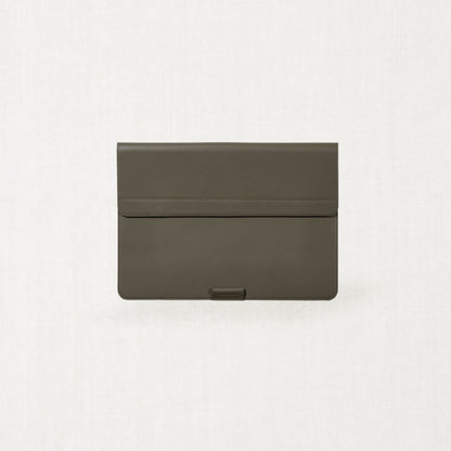 Labovarde Laptop Stand Case in Etoupe — Front view centered on a minimalist textured gray background