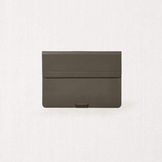 Labovarde Laptop Stand Case in Etoupe — Front view centered on a minimalist textured gray background