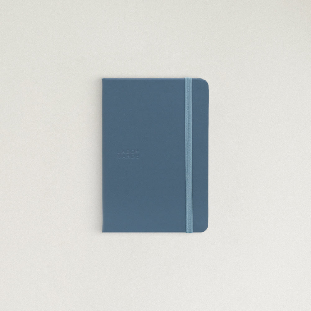 Labovarde Handy Note in Pale Blue— Front view of the leather cover in Pale Blue