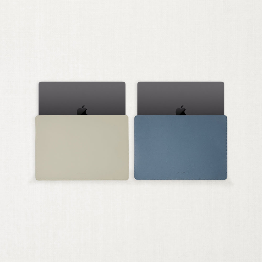 Labovarde Laptop Sleeve in Assorted Color — Front view with a space gray MacBook inside the Light-Yellow, Pale-Blue Sleeves