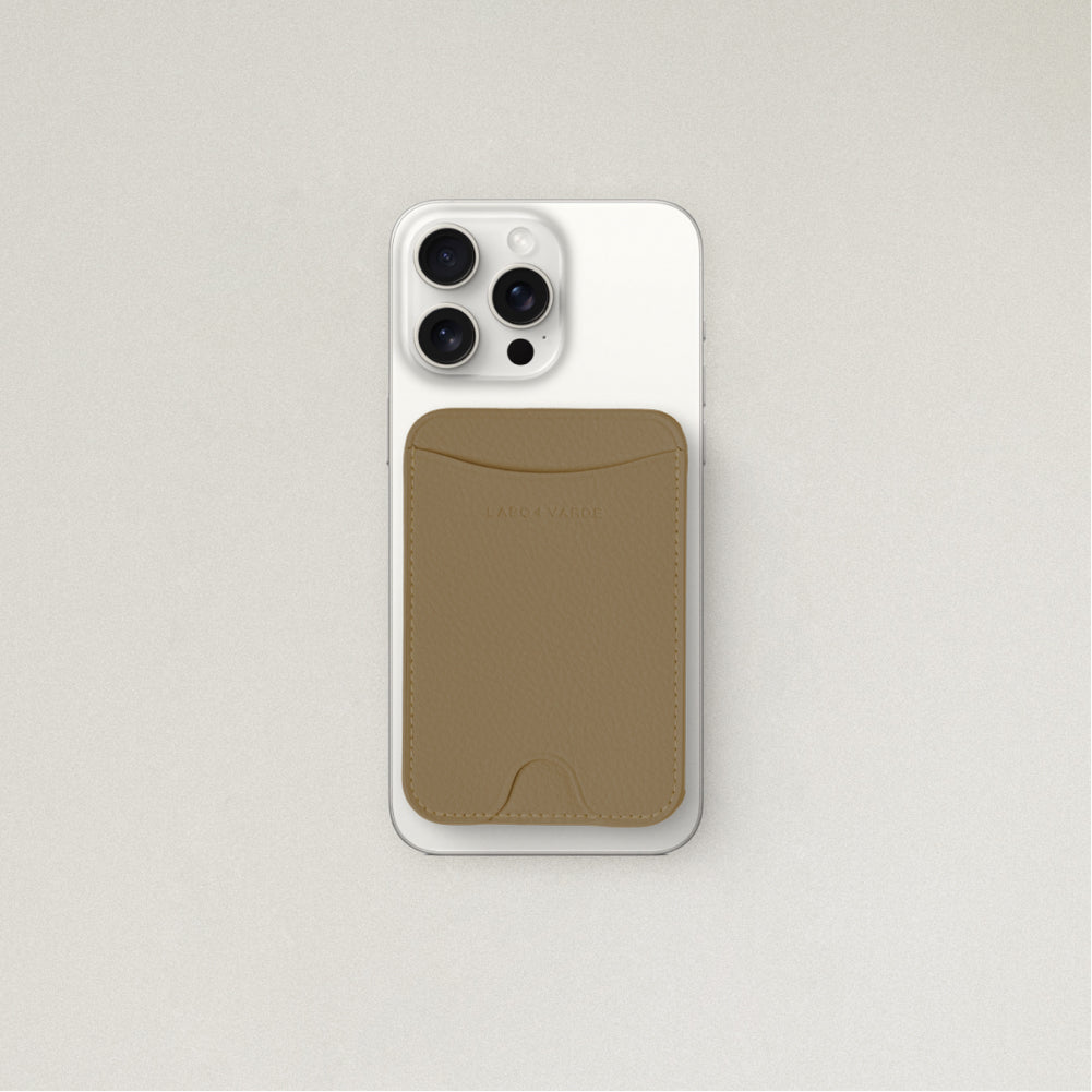 Labovarde MagSafe Card Wallet in Camel Brown — Attached to a white iPhone, showing the magenetic fit and debossed logo