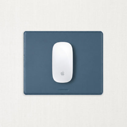 Labovarde Mouse Pad in Pale-Blue — Top-down view of a whit mouse on the Pale-Blue Mouse Pad