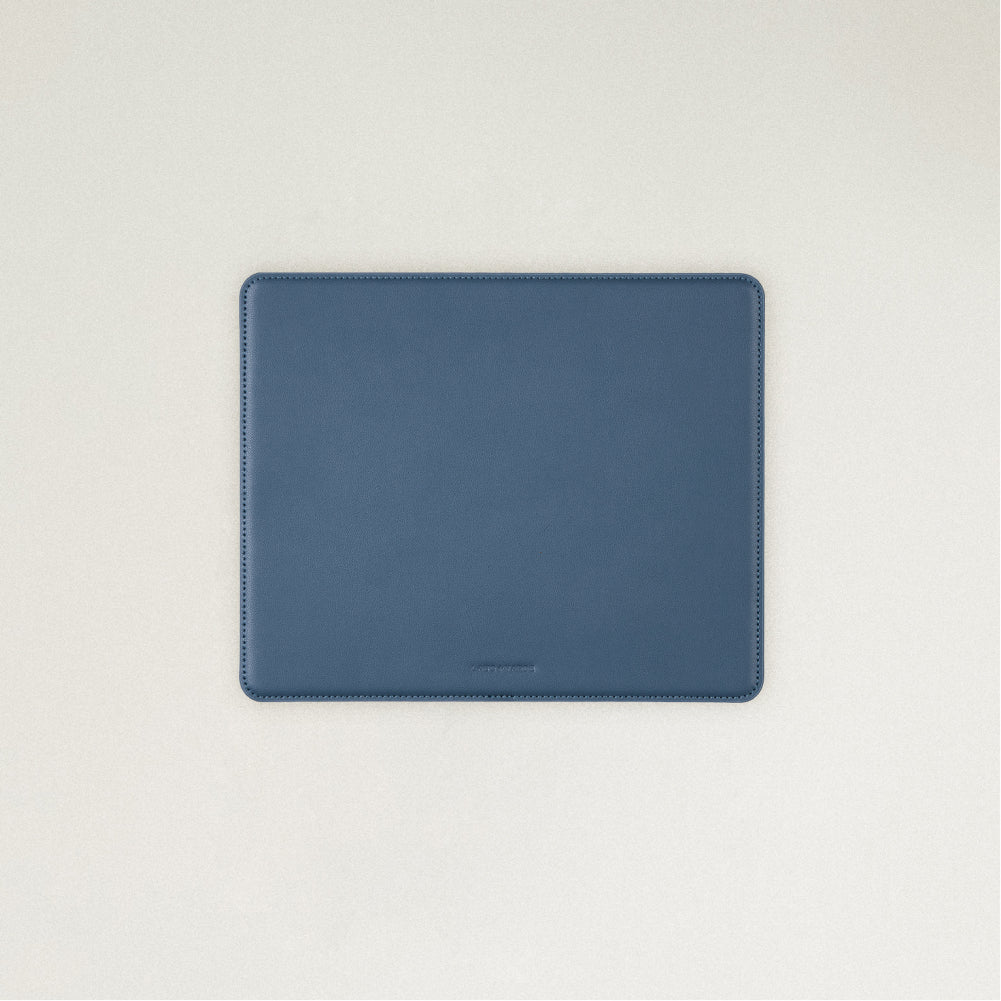 Labovarde Mouse Pad in Pale Blue — Flat lay view of the mouse pad centered on a light gray background