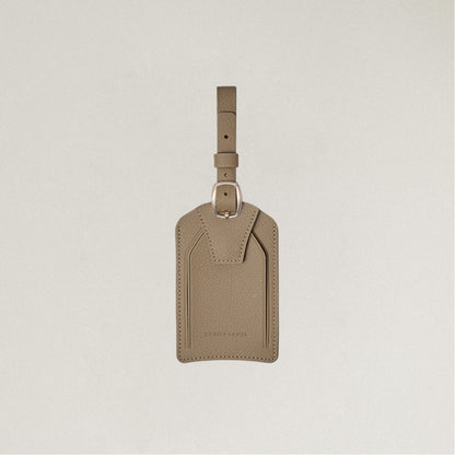 Labovarde Name Tag in Camel Brown — Front view centered on a minimalist textured white background