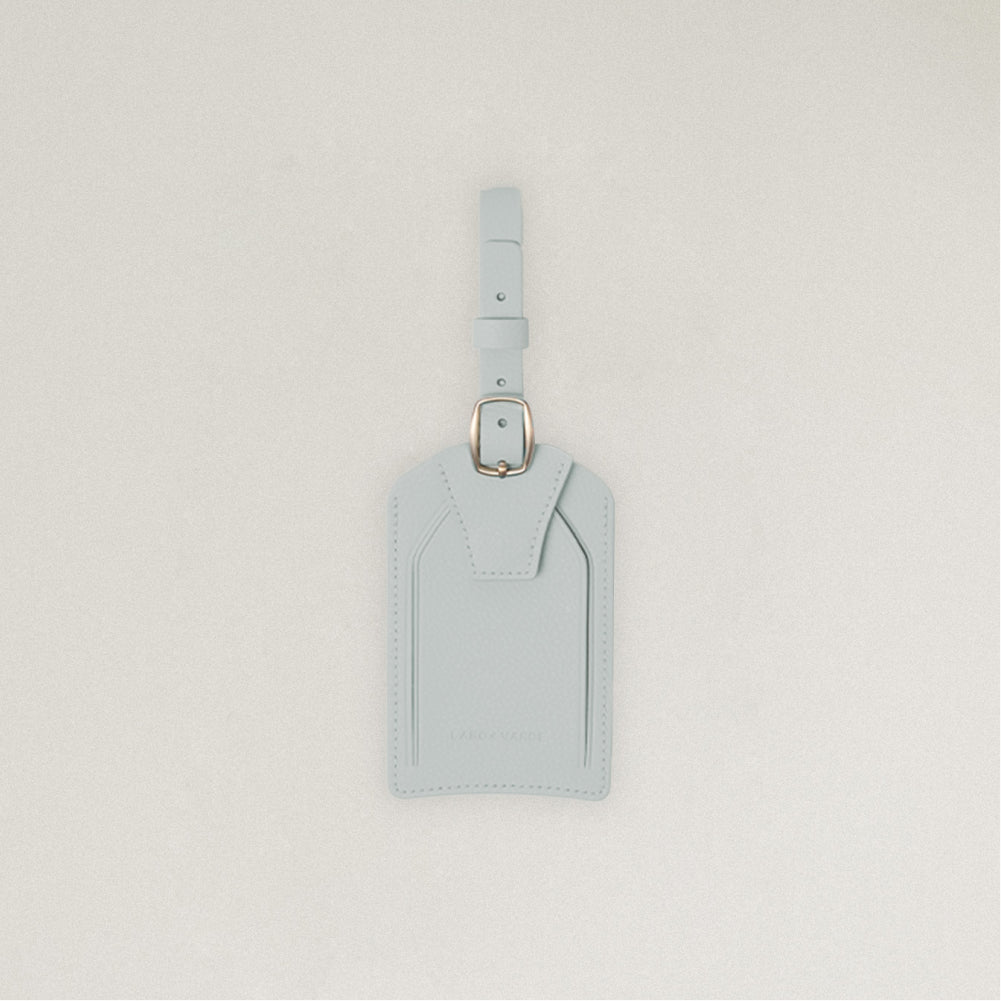 Labovarde Name Tag in Clear Blue — Front view centered on a minimalist textured white background