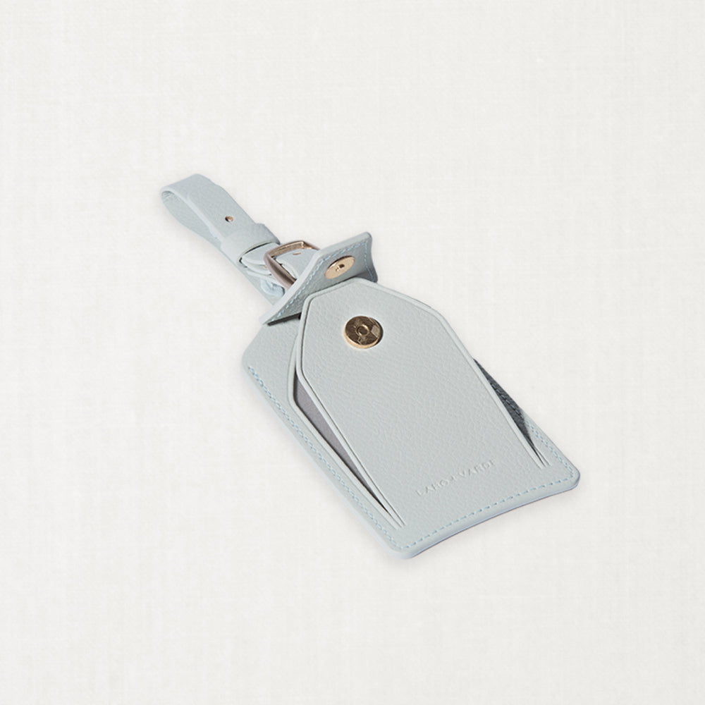 Labovarde Name Tag in Clear Blue — Detailed view showing folding function on a white background