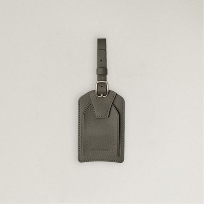 Labovarde Name Tag in Etoupe — Front view centered on a minimalist textured white background