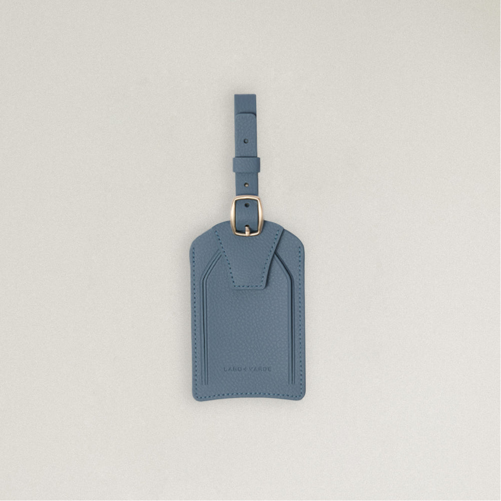 Labovarde Name Tag in Pale Blue — Front view centered on a minimalist textured white background