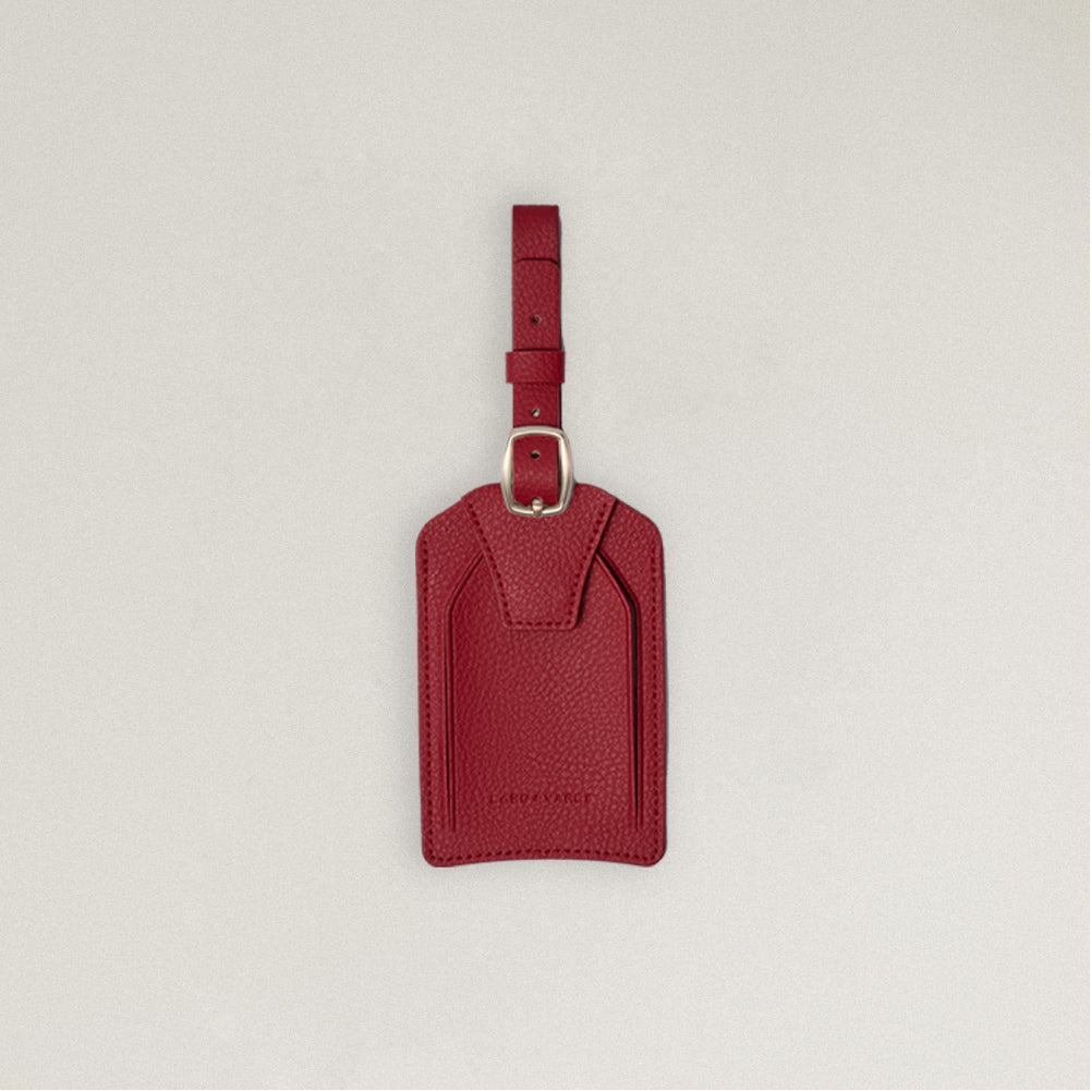 Labovarde Name Tag in Red — Front view centered on a minimalist textured white background