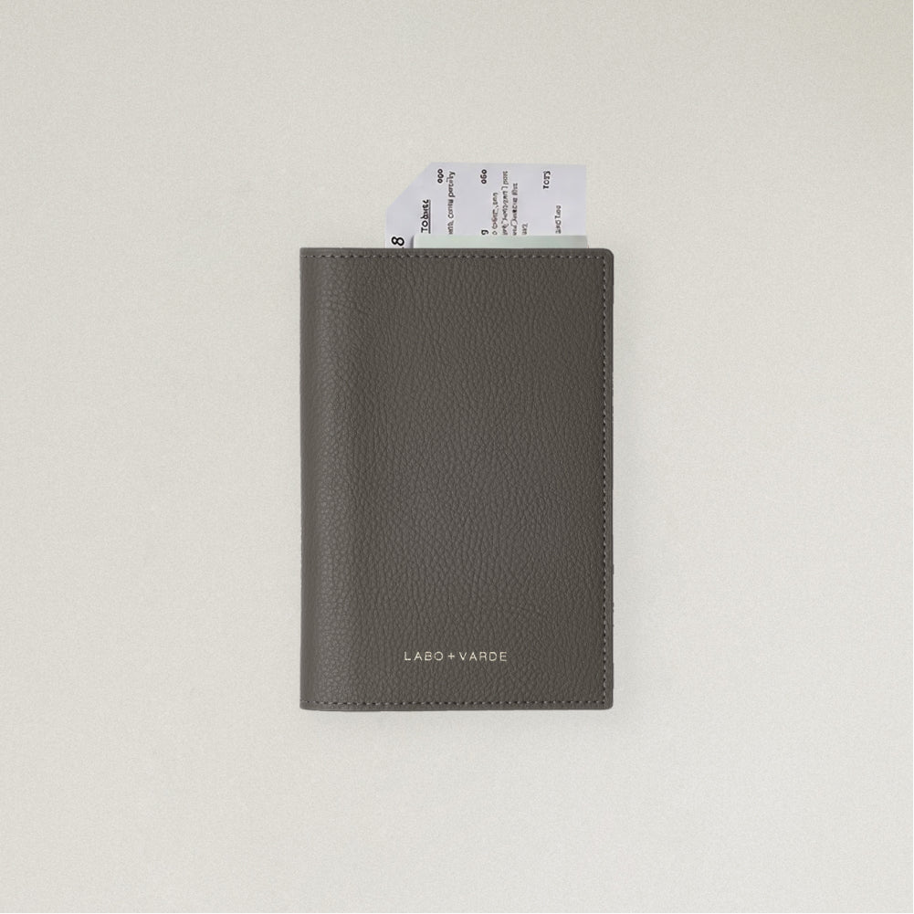 Labovarde Passport Case in Etoupe — front view showing passport cover and Tickets in Case on a white Background