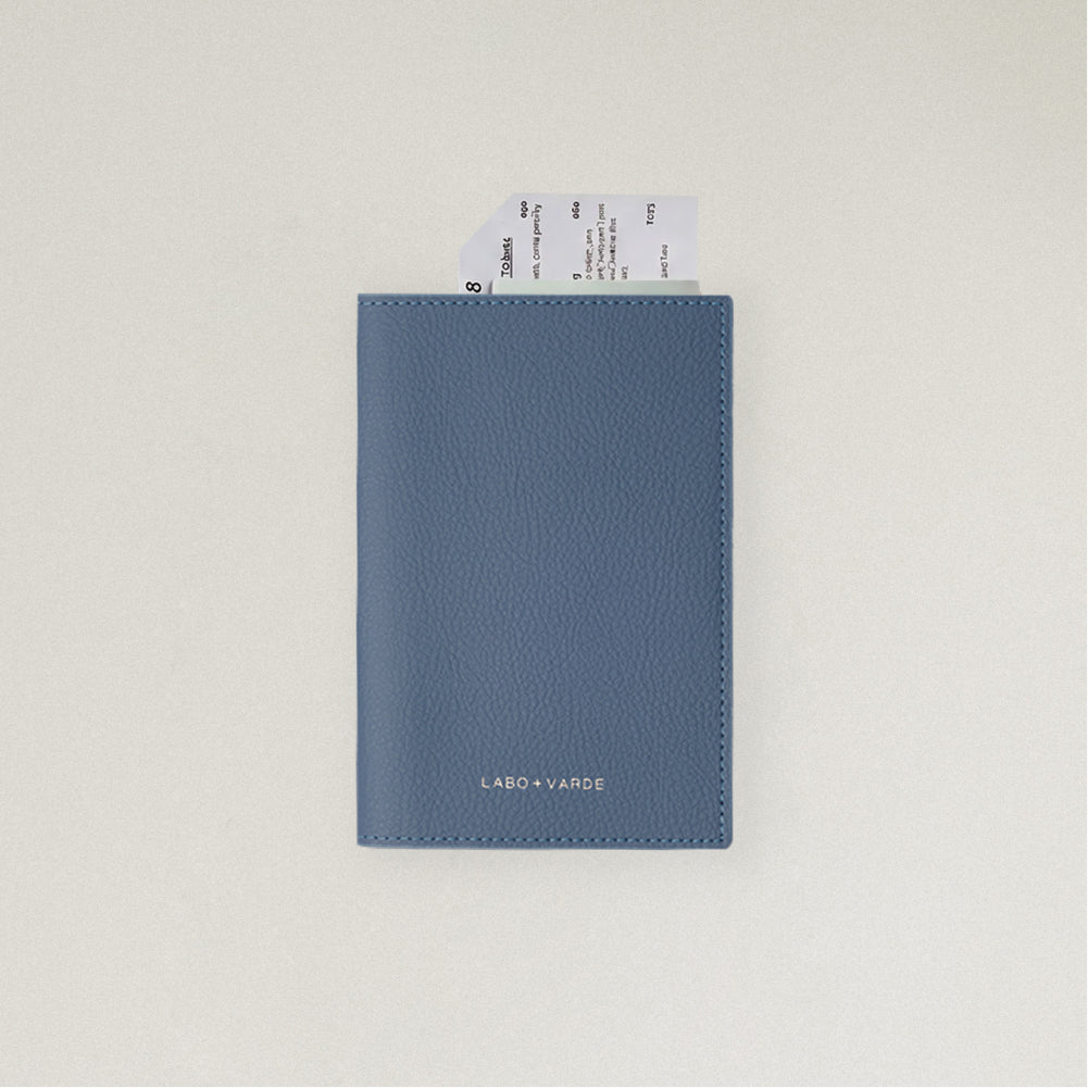 Labovarde Passport Case in Pale Blue — front view showing passport cover and Tickets in Case on a white Background