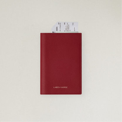 Labovarde Passport Case in Red — front view showing passport cover and Tickets in Case on a white Background