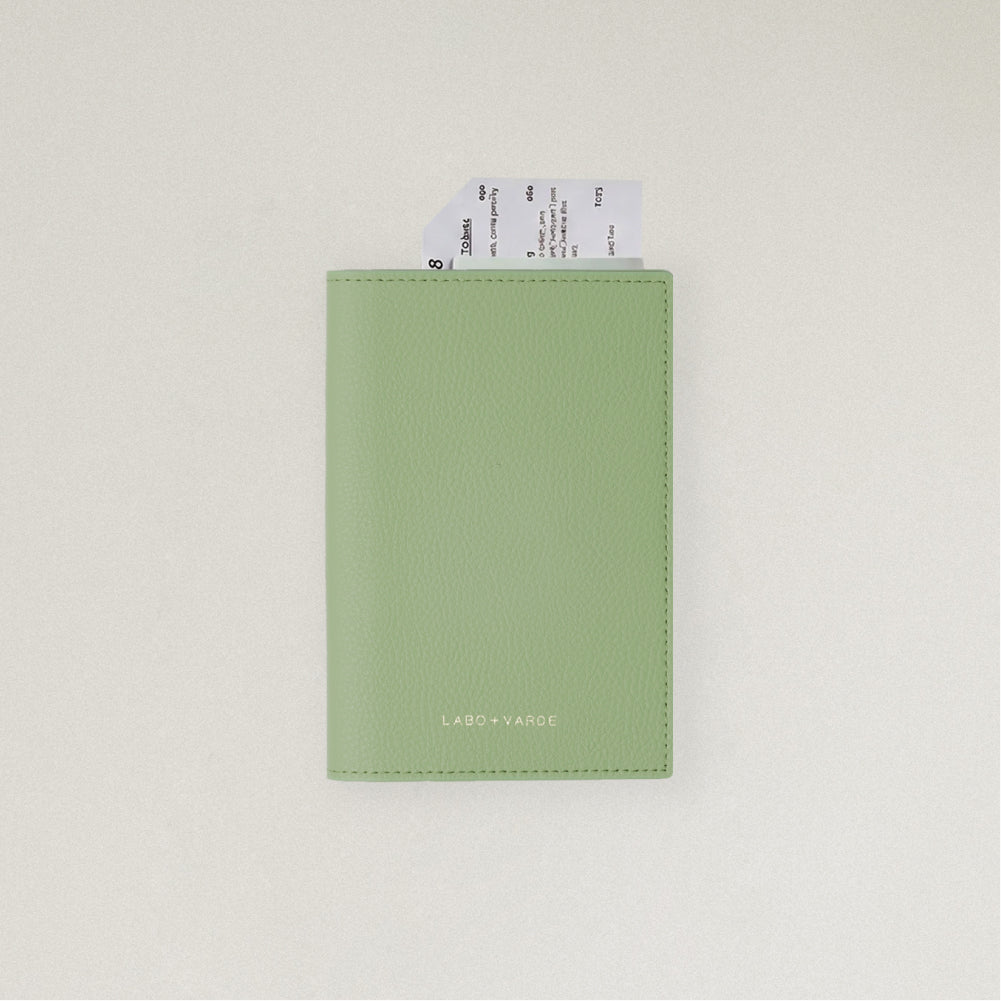 Labovarde Passport Case in Sage Green — front view showing passport cover and Tickets in Case on a white Background