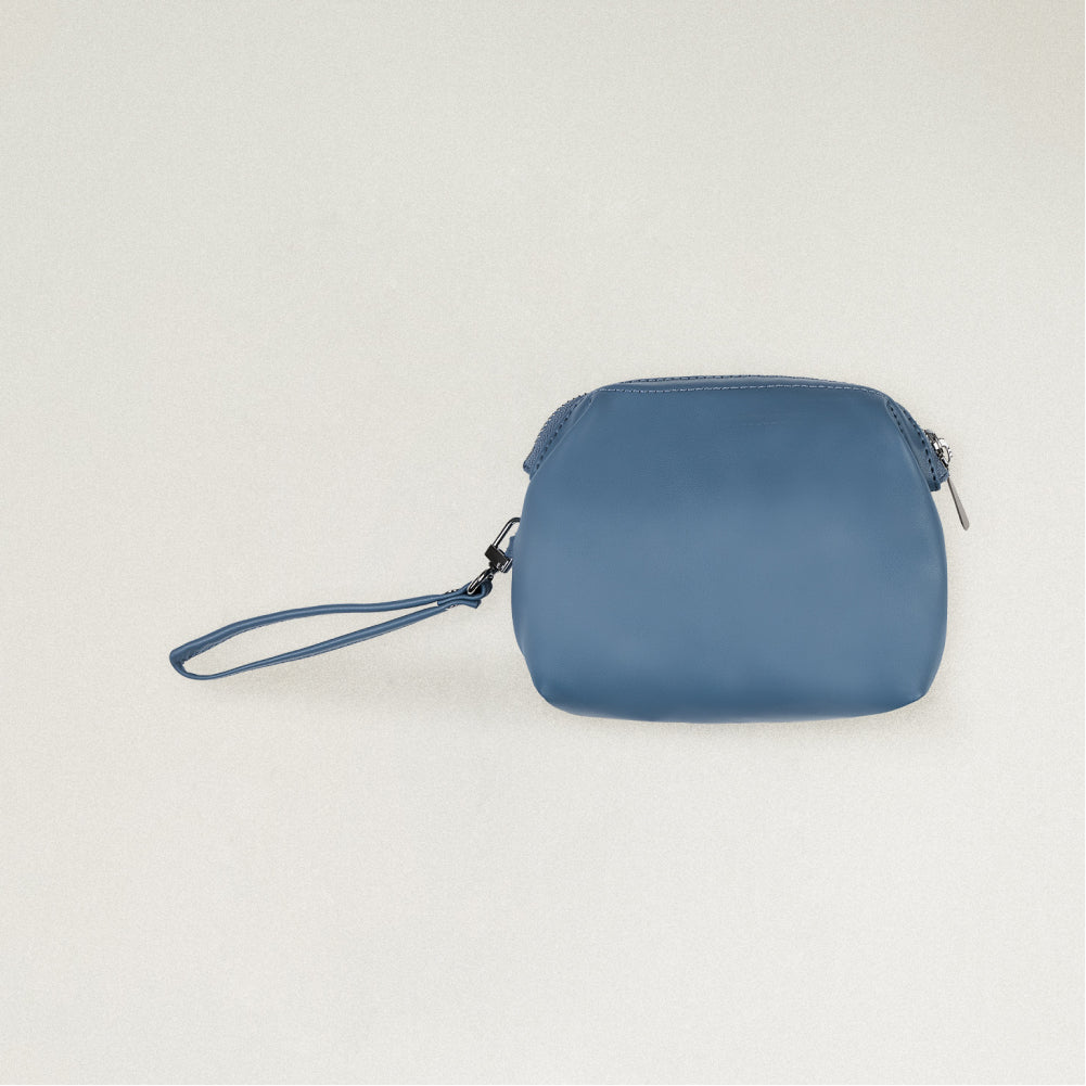 Labovarde Shell Pouch Bag in Pale Blue — Clean front view highlighting the top zipper closure and convenient wristlet strap.