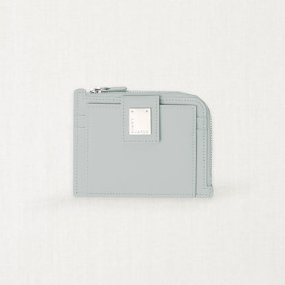 Labovarde Zipper Card Wallet in clear-blue — Front view highlighting the signature silver metal plate and zipper closure