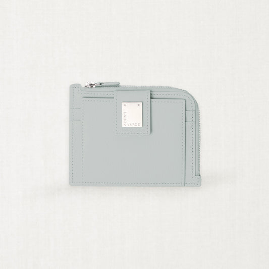 Labovarde Zipper Card Wallet in clear-blue — Front view highlighting the signature silver metal plate and zipper closure
