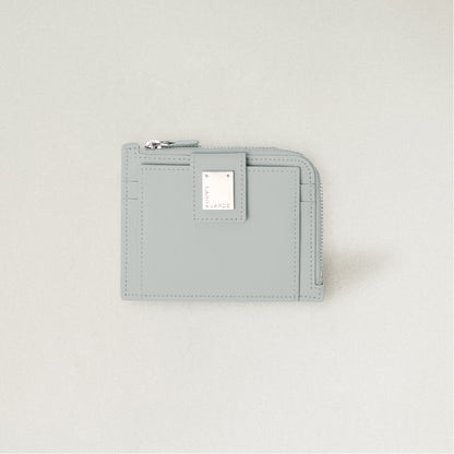 Labovarde Zipper Card Wallet in Clear Blue— Front view highlighting the signature silver metal plate and zipper closure
